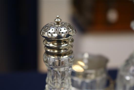 A quantity of plated items incl. two pairs of entree dishes, four cruet stands, cased dessert eaters, whisky flask and minor flatware